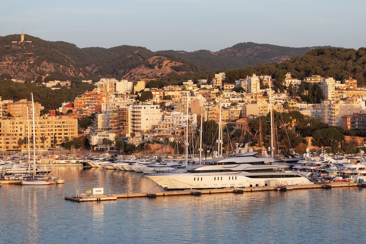 Boats In A Marina With Downtown City Buildings By Balearic Sea. Palma, Balearic Islands, Spain.