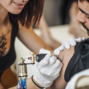 Tattooing Process In A Tattoo Studio